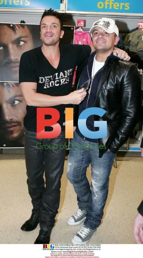 Peter Andre signing books in Tesco's