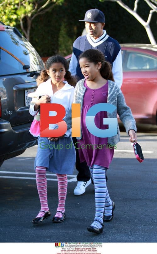 Russell Simmons shops with daughters in LA