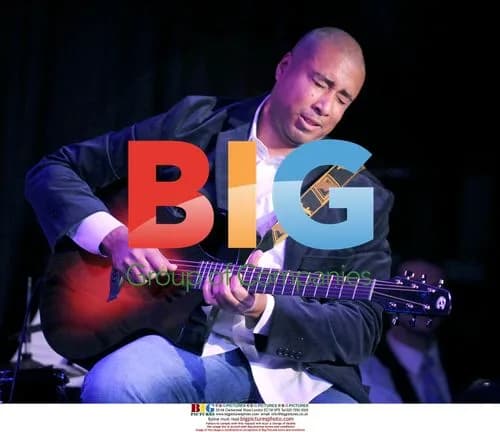 Bernie Williams Performs at Bat For The Cure Event