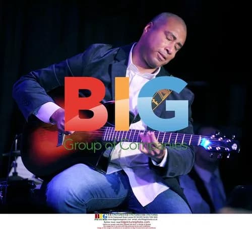 Bernie Williams Performs at Bat For The Cure Event
