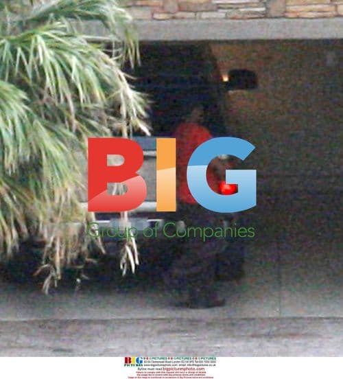 Dr. Conrad Murray returns home before DEA raid