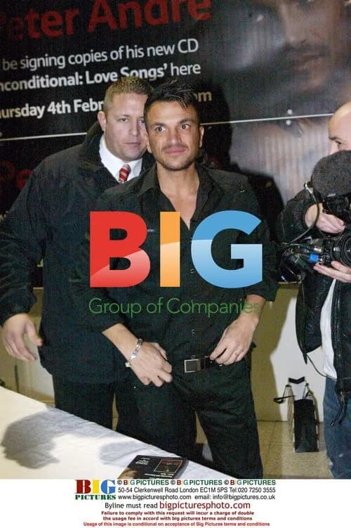 Peter Andre Signs Album Copies