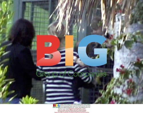 Kirstie Alley with pet monkeys