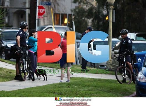Rose McGowan Walking Dog With Friend
