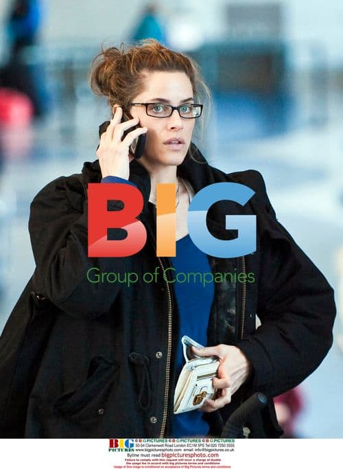 Amanda Peet and Family at LAX