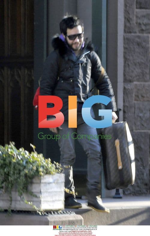 Ashlee Simpson and Pete Wentz with son at JFK