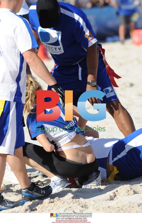 Marisa Miller and Tom Arnold at Celebrity Beach Bowl