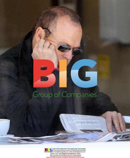 Michael Keaton Enjoys Coffee and Newspaper