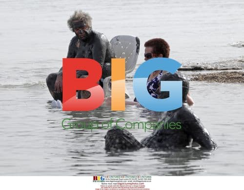 Tourists enjoy Dead Sea in warm weather