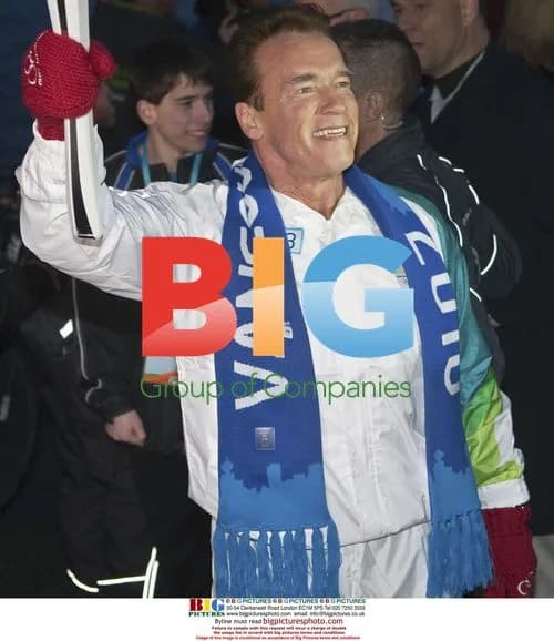 Arnold Schwarzenegger carries Olympic torch