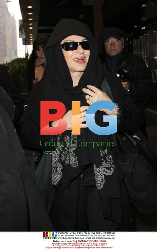 Gloria Estefan Leaves Hotel in Snow