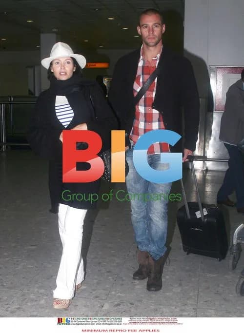 Dannii Minogue and Kris Smith Arrive at Heathrow