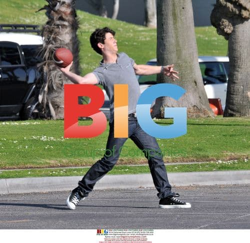 Jonas Brothers Play Football on Set