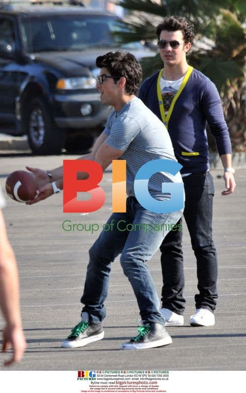 Jonas Brothers Play Football on JONAS Set