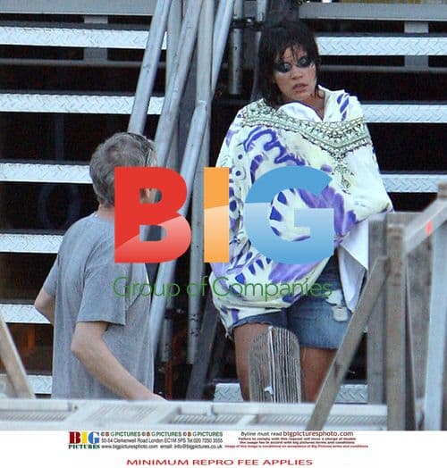 Lily Allen Takes Tumble Backstage