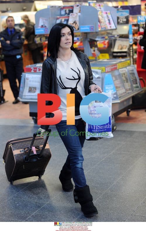Kym Marsh buying magazines at train station
