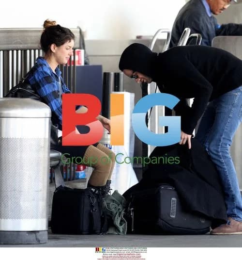 Shenae Grimes Arrives at LAX in Matching Outfit