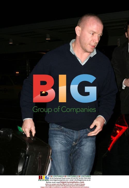 Guy Ritchie Arrives at JFK with Sons