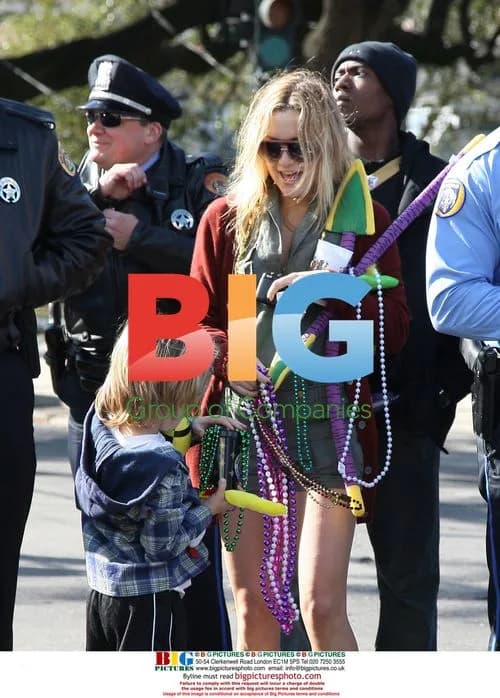 Kate Hudson with son at Mardi Gras