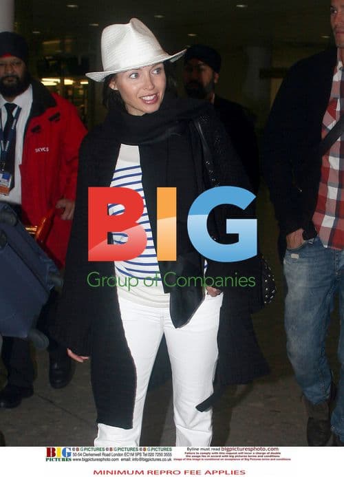 Dannii Minogue and Kris Smith at Heathrow