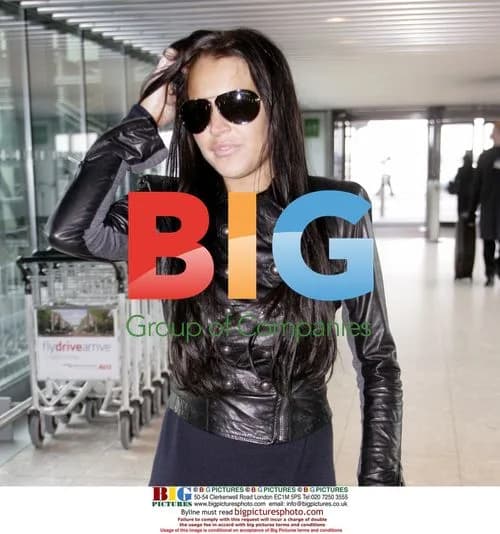 Lindsay Lohan Arrives in London