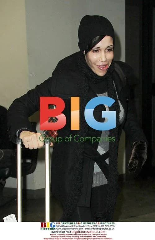 Octomom Makes Faces at JFK Airport
