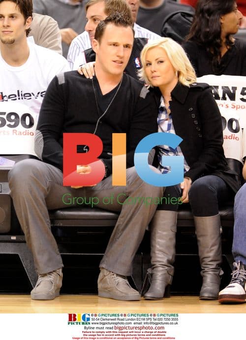 Elisha Cuthbert and Dion Phaneuf at Raptors Game