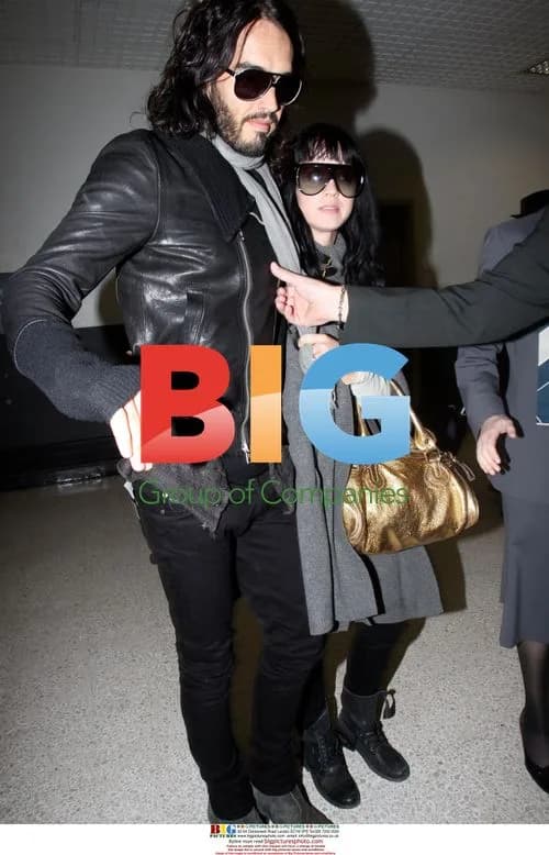 Katy Perry and Russell Brand Arrive at LAX