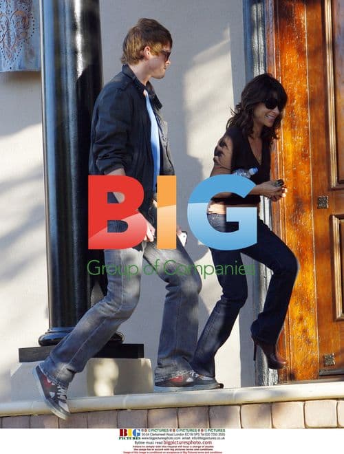 Paula Abdul Arrives Home with Friend