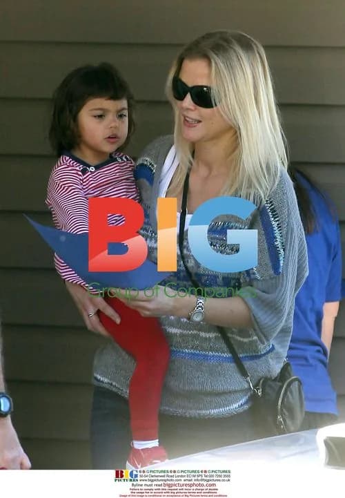 Elin Nordegrens picks up daughter Sam from school