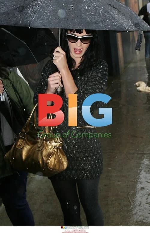 Katy Perry Heads Out in Rain to Meet Friend