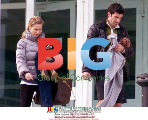 Luis Figo and wife leave gym