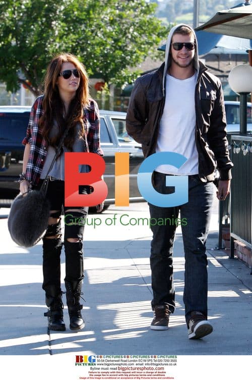 Miley Cyrus with Liam Hemsworth and Puppy