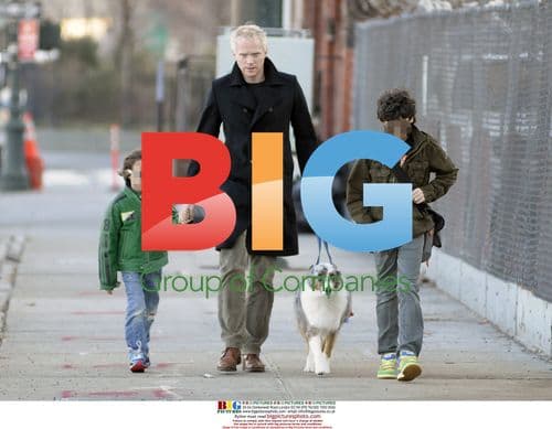 Paul Bettany with sons and dog