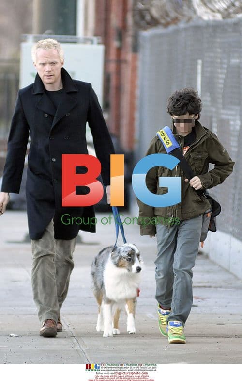 Paul Bettany with sons and dog