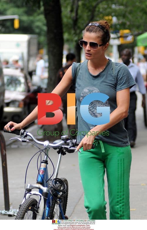 Helena Christensen Walks with Bike in NYC