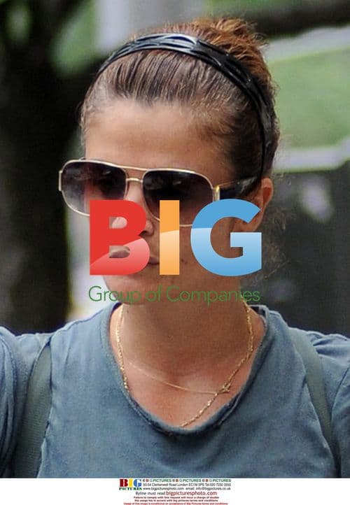 Helena Christensen rides bike in NYC