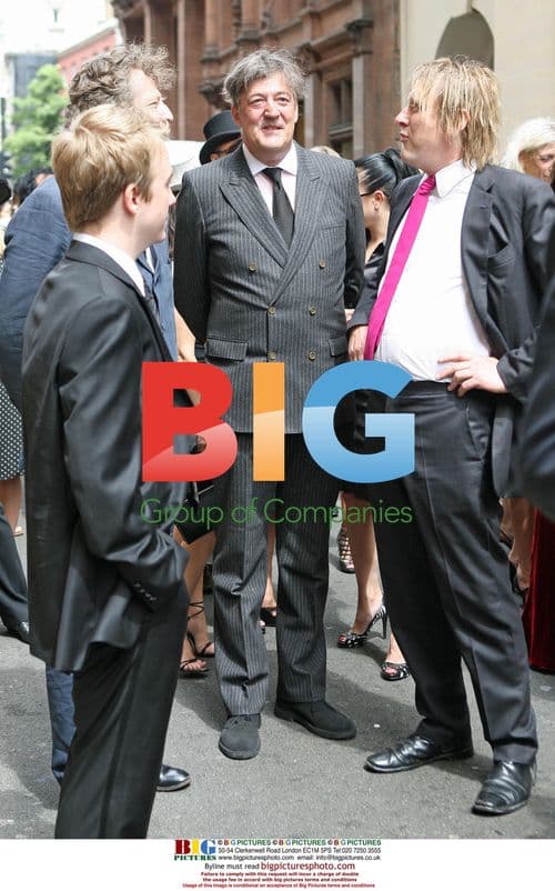 Stephen Fry Attends Funeral