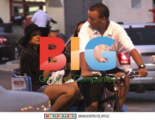 Ashley Cole meets mystery girls at LA beach party