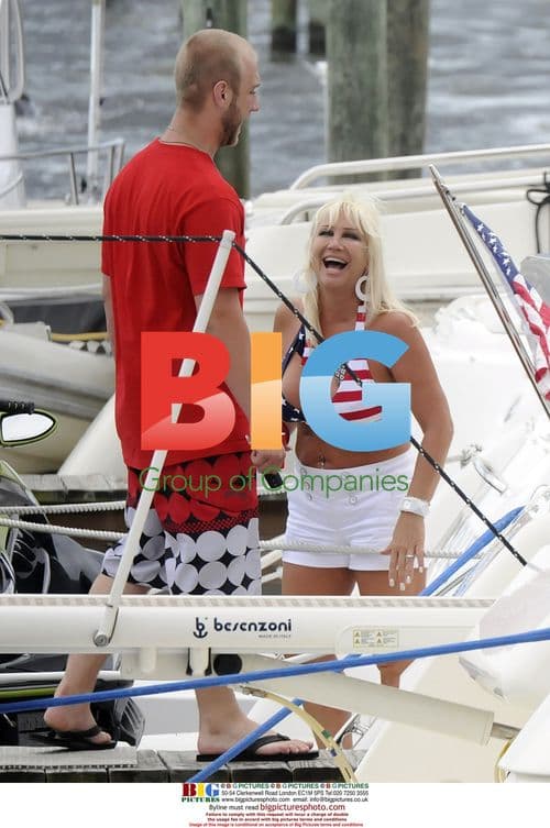 Linda Hogan with Boyfriend and Son on Yacht