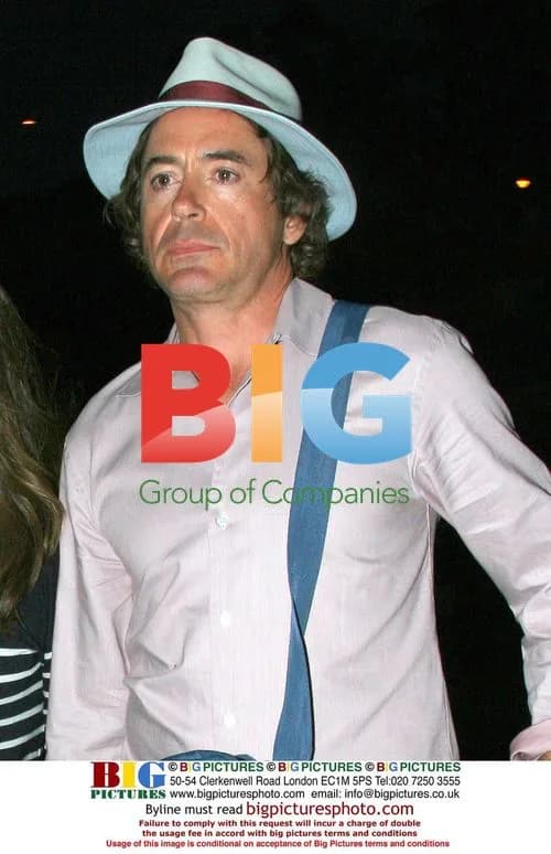 Robert Downey Jr. and Susan Leave Cafe Habana