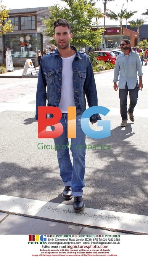 Adam Levine Leaves Cafe Habana on Motorcycle