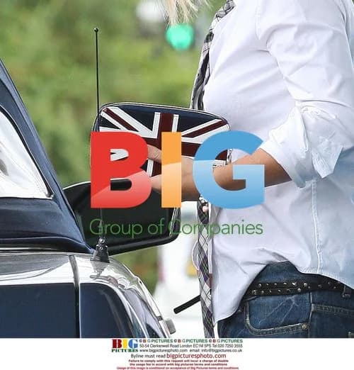 Geri Halliwell Fueling Car
