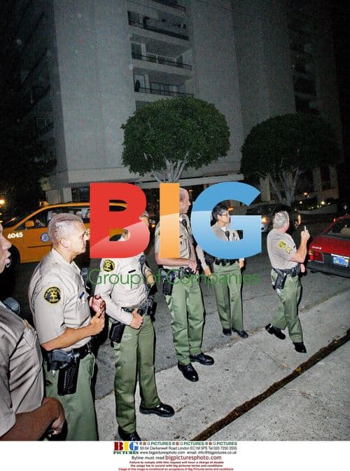 Police at Lindsay Lohan's condo