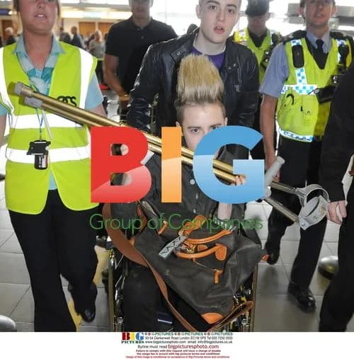 Jedward Arrive at Dublin Airport with Injury