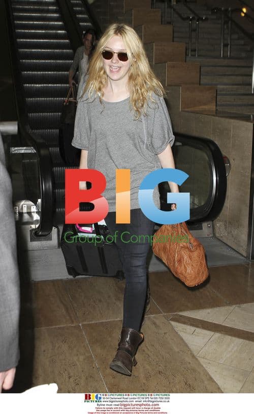 Dakota Fanning Arriving at LAX Airport