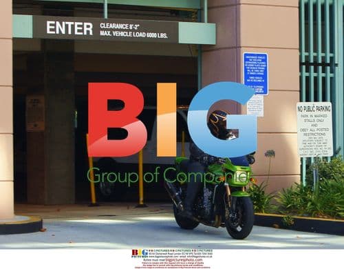 Jesse James Leaves Court on Motorcycle