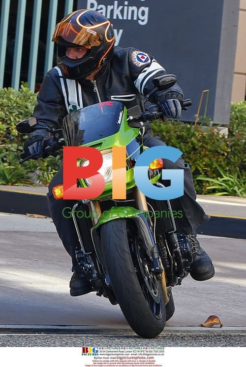 Jesse James Leaves Court on Motorcycle