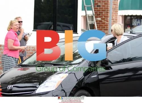 Renee Zellweger talks to fans and baby