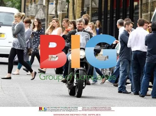 Adrian Chiles rides motorcycle without helmet